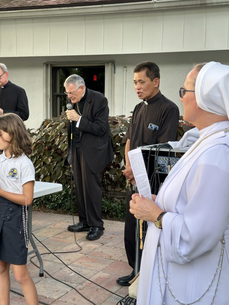 Bishop Gerald M. Barbarito celebrates Mass at Emmanuel Catholic Church in honor of Our Lady of the Holy Rosary.