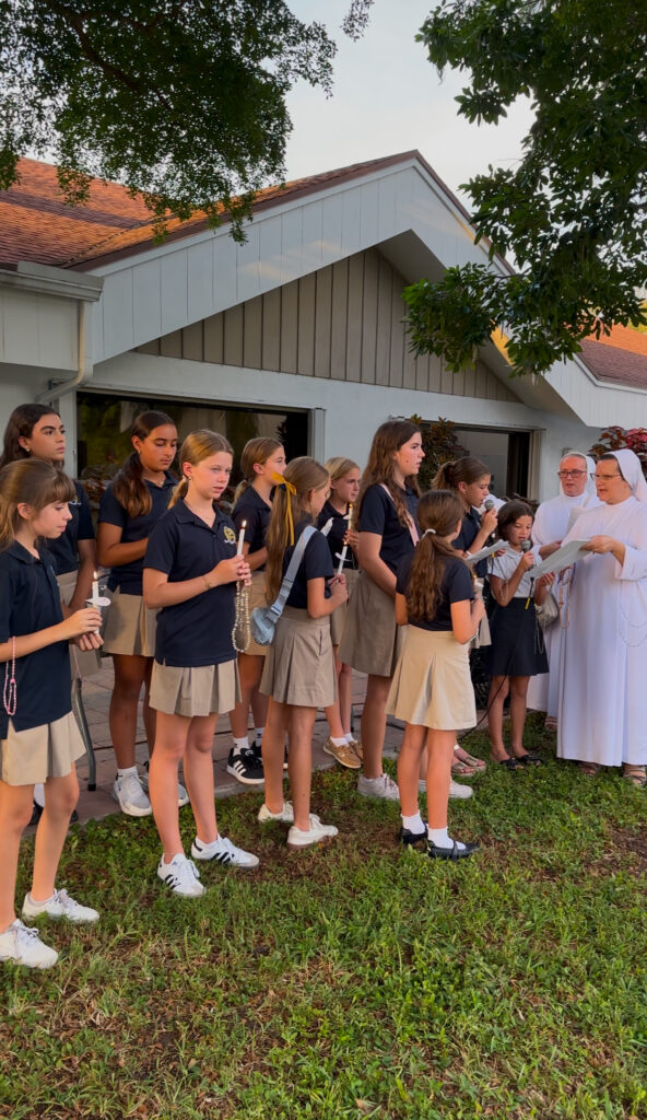 Students from St. Vincent Ferrer Catholic School lead the Rosary with devotion during the Steps for Life event in Delray Beach.